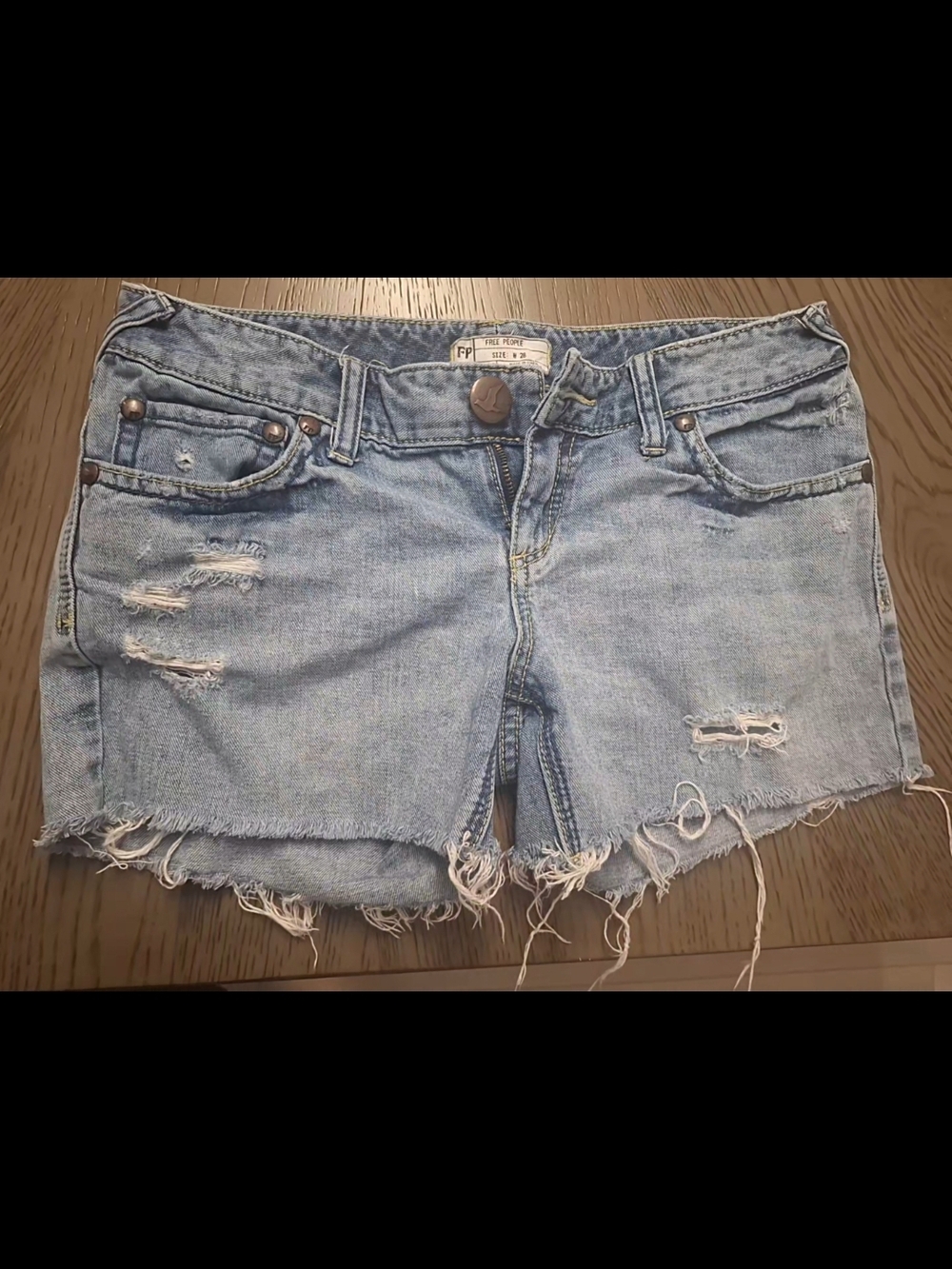 Free People--- Faded Light Blue Distressed Denim Cutoff Shorts